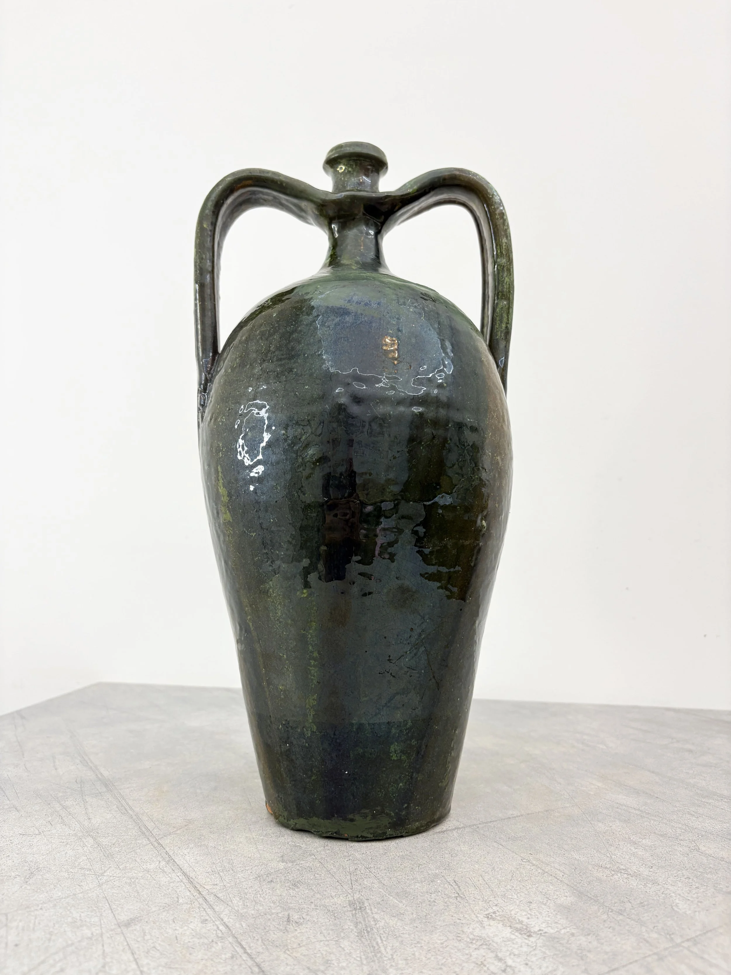 antique green ceramic amphora southern Italy