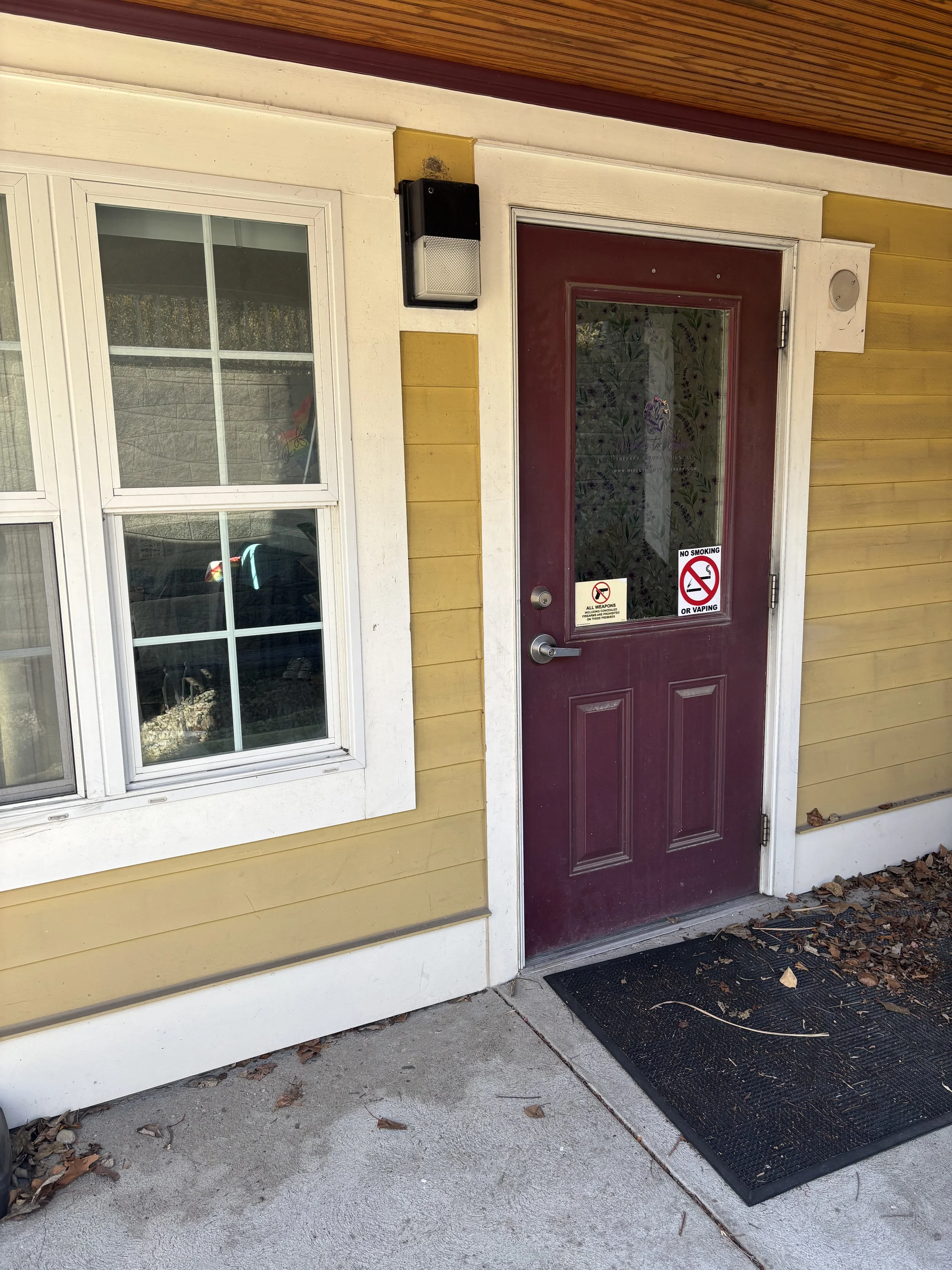 The main entrance is accessed by the parking lot. 