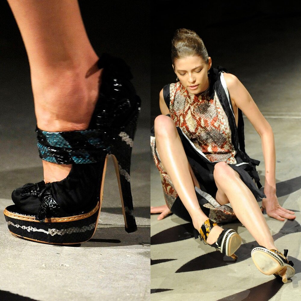  A model falls at the Prada Spring 2009 runway show. 