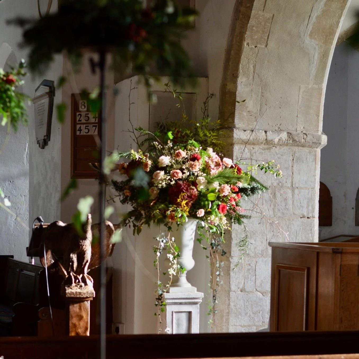 Our last wedding of 2025 was a celebration of rich tones and textures. Large scale urns and an abundant and free installation for the church entrance at St John's Boldre. 

#winterwedding #decemberwedding #Hampshireflorist #Lymingtonflorist #churchwe