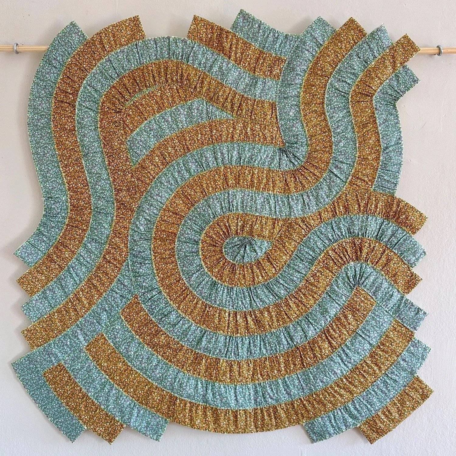 Naomi Detre “Sun Wobbles”, textiles, 29" x 31", 2025, $1,750