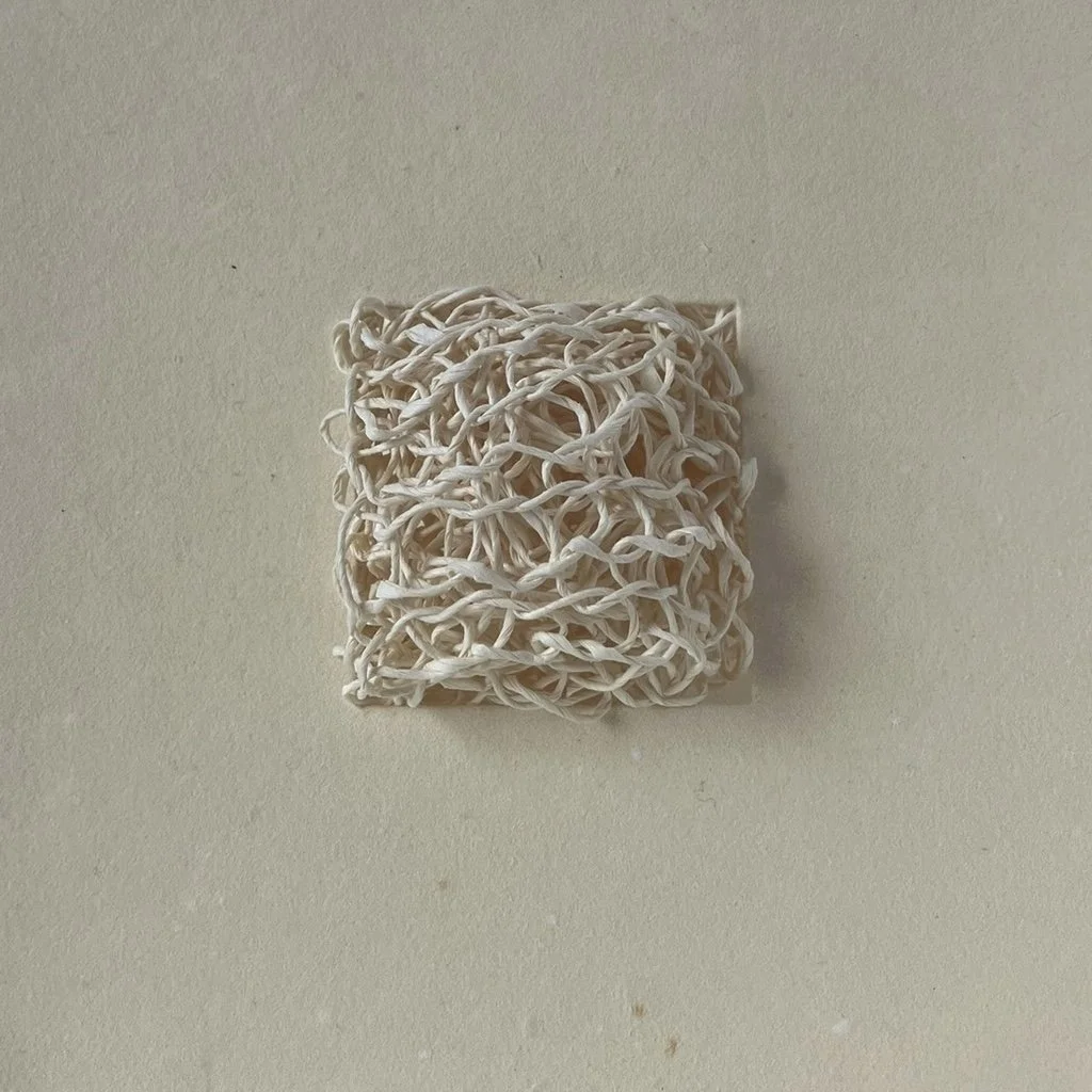 Sabine Thornau "Structures 2", handmade paper, paperyarn, 6" x 6" x 1.8", 2026, $450