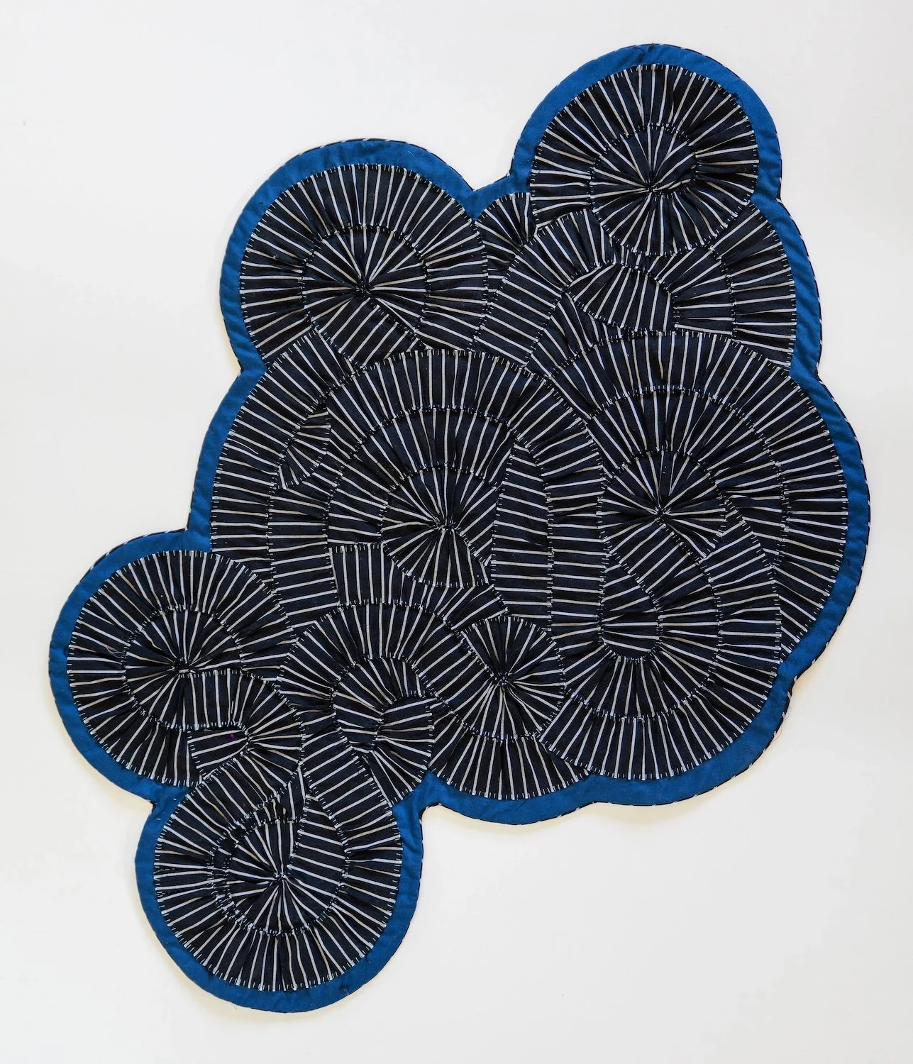 Naomi Detre “Deep Sea Spike”, textiles, 27" x 32", 2026, $1,820