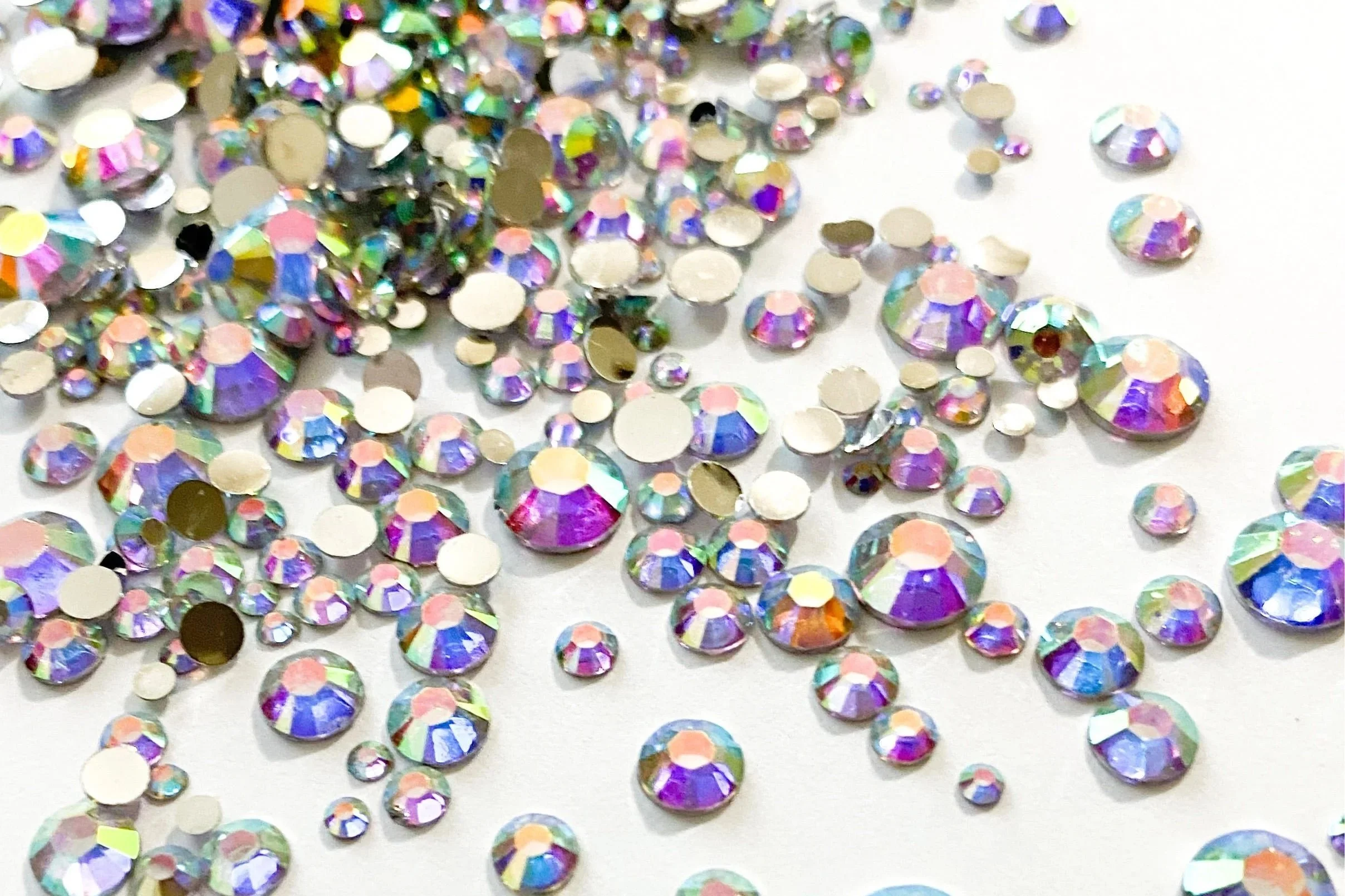 Book bedazzling with Sigma Tau Delta and Gandy Dancer