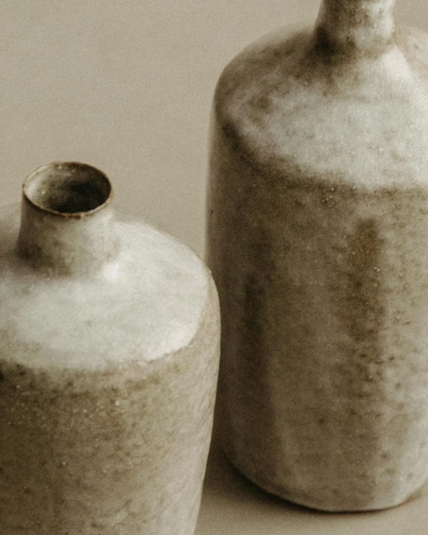 Two straight sided vessels with washy, nebulous glaze. Pinched and coiled. Only at @wondering.people ☁️

#handbuiltceramics #slowmade