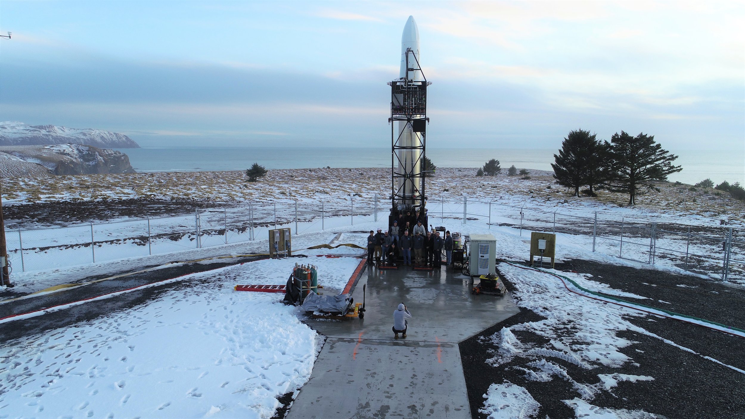 Here's the Astra and DARPA teams with the rocket raised on the pad. Why so many photos of the Astra rocket? Because it was the only one that made it to the pad ... though it never made it *off* the pad.