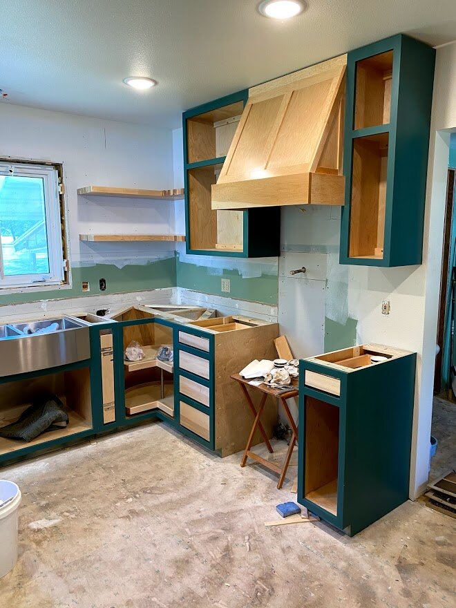 Wall cabinet boxes are installed.
