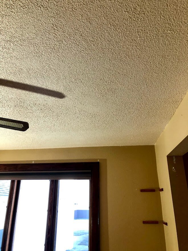 You can see the line where the ceiling has been scraped close to the window wall.