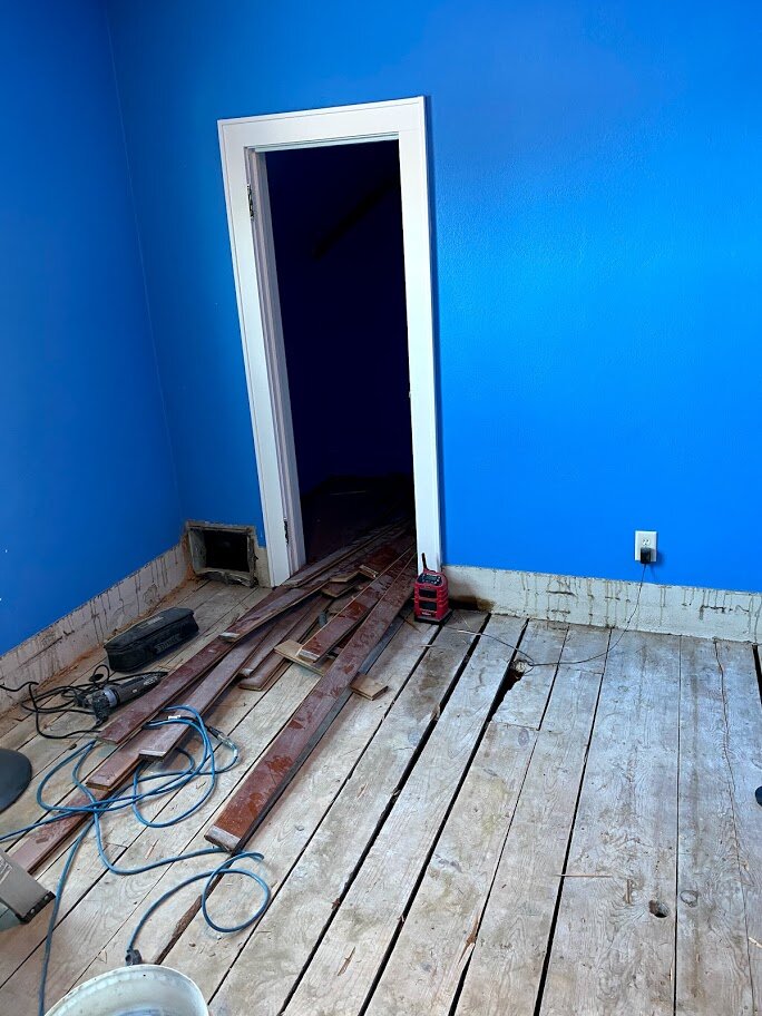 The closet door in the bathroom.