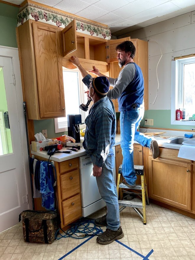 The old cabinets coming down.
