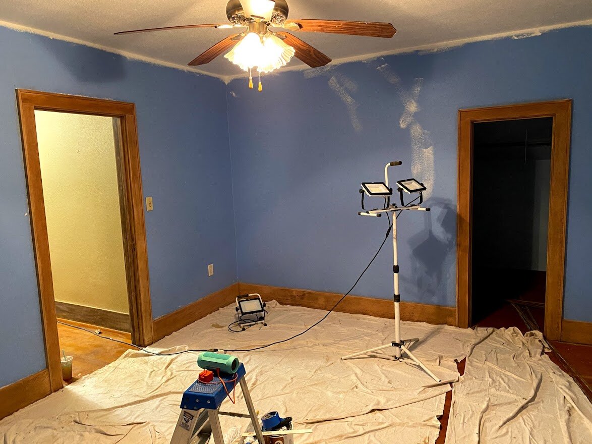 Trim is down to the bare wood in the bedroom!