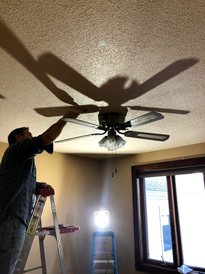 Day One: Bruce and I scraped the popcorn ceilings in the living and dining rooms.