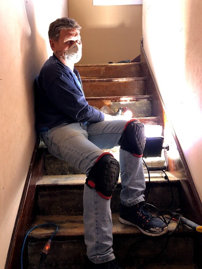Bruce removing carpet glue.