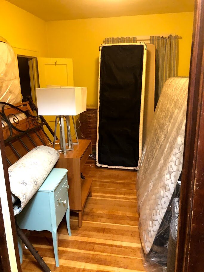 All upstairs furniture is crammed in one bedroom while we work everywhere else.
