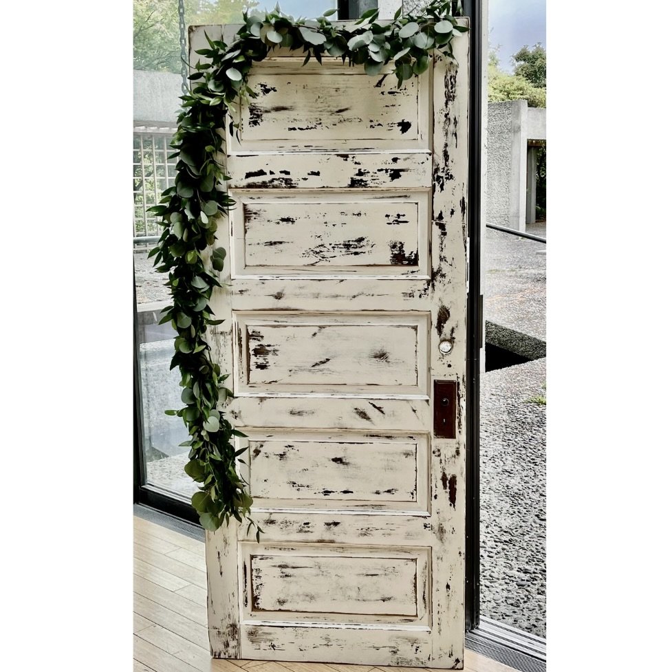 Rustic, shabby chic, vintage white wedding backdrop doors.