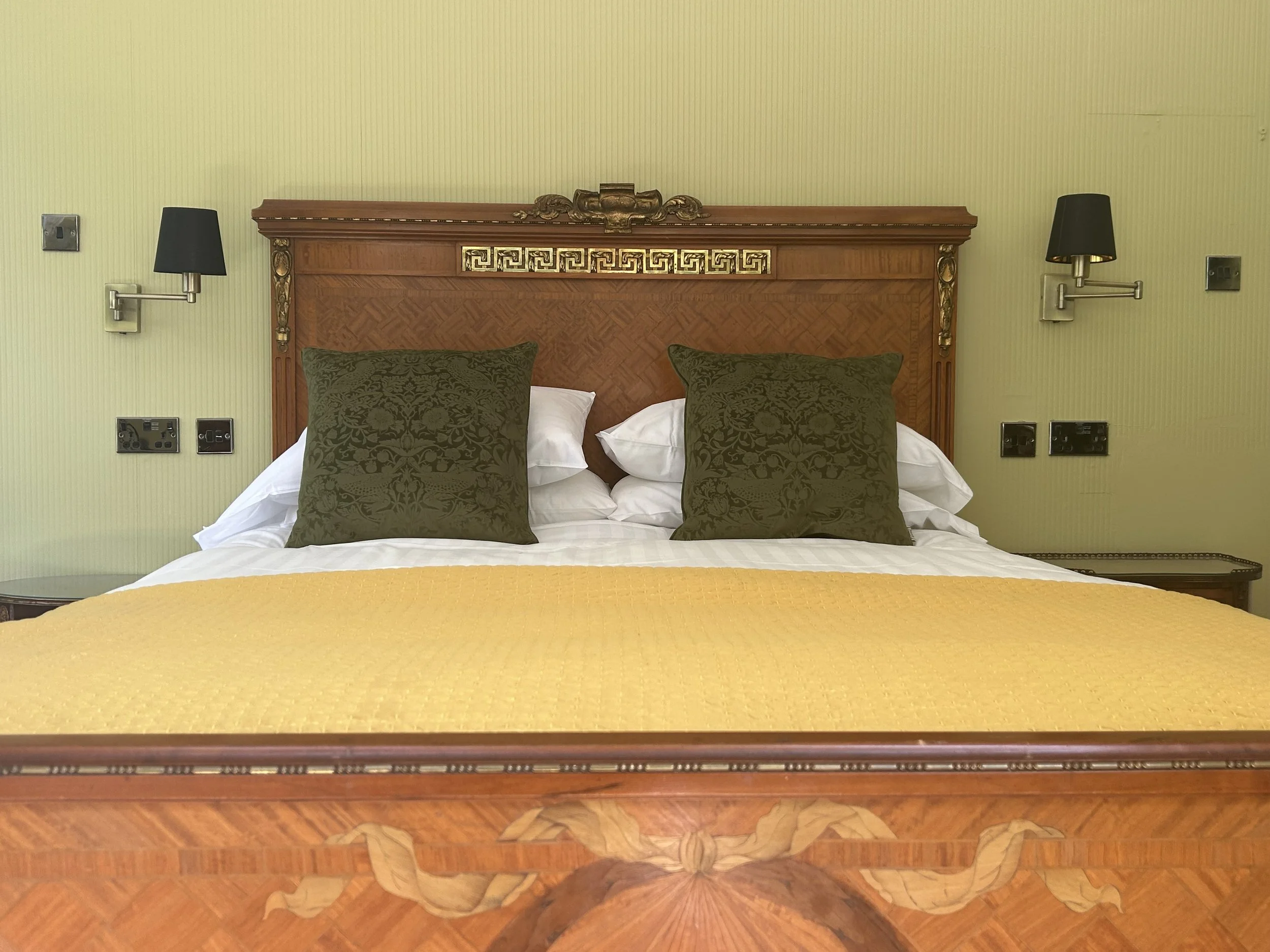 Ornately decorated antique bed.