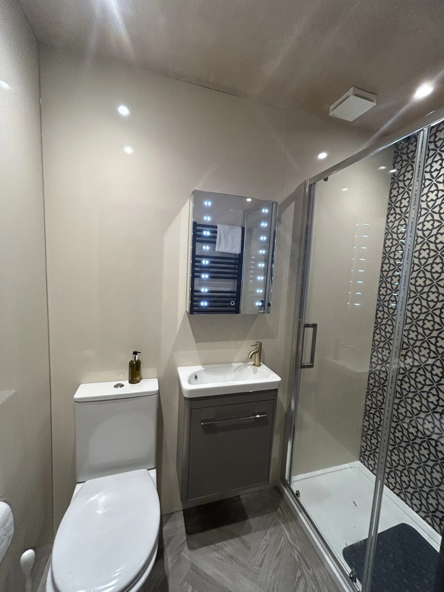 En suite bathroom with double walk-in shower