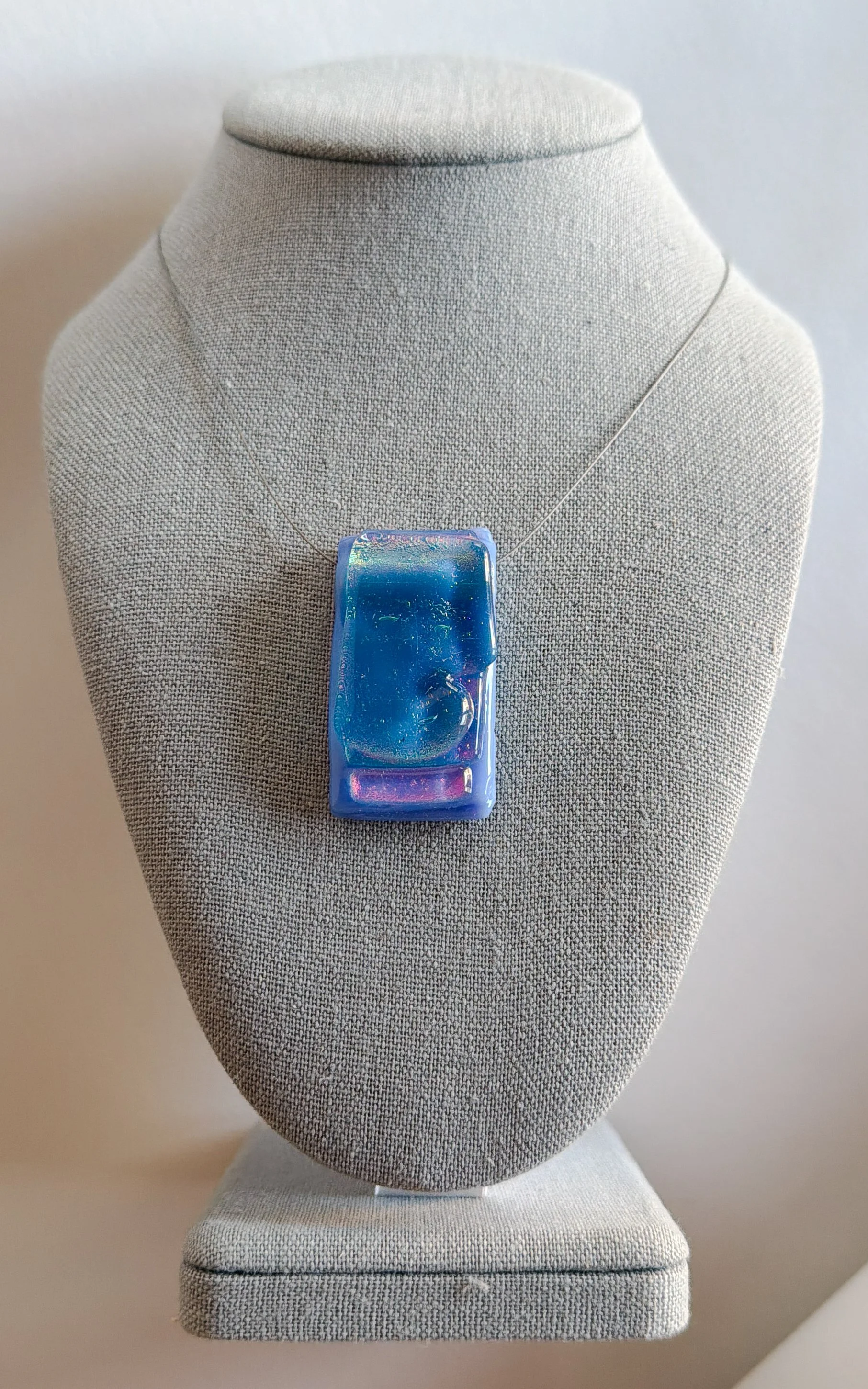 holding-summer-necklace-rectangle-150-1.jpg