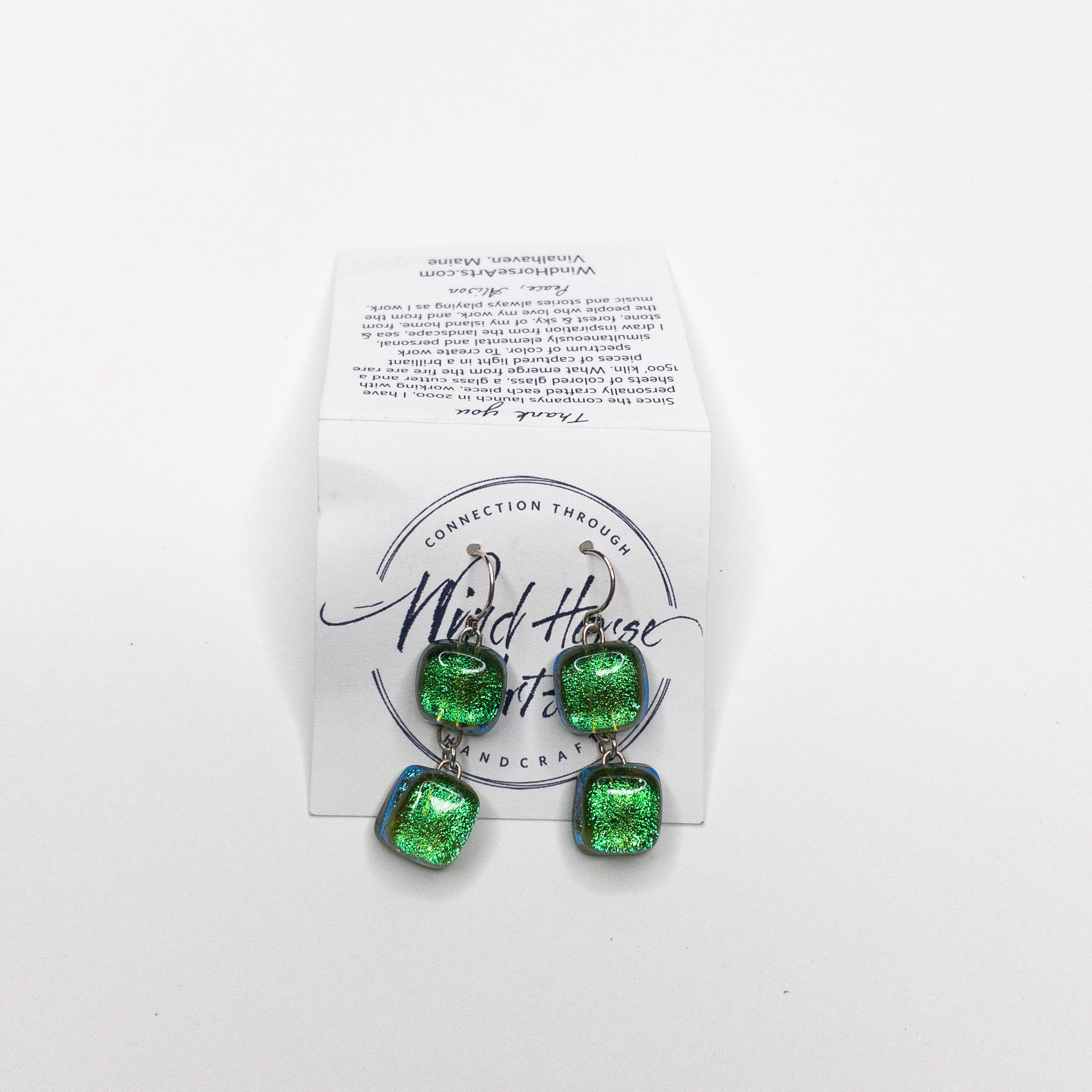 Handmade Shamrock Sparkle fused dichroic glass linked earrings with sterling silver connections, featuring vibrant green tones, perfect for adding a touch of color and style."