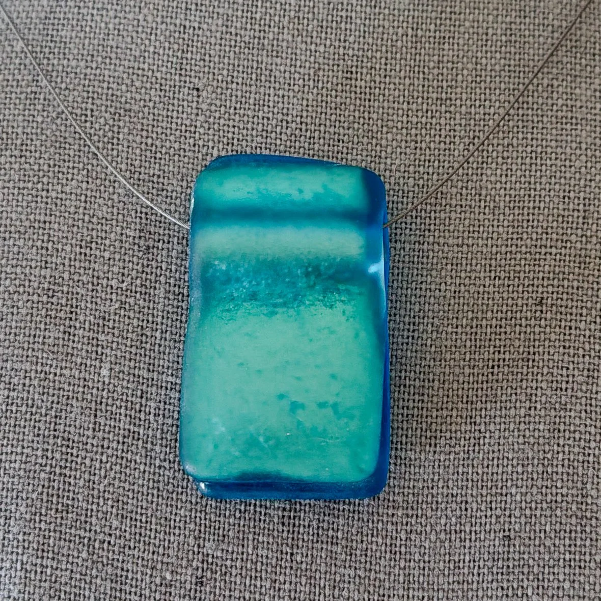 barefoot-in-blue-necklace-rectangle-150s-1.jpg
