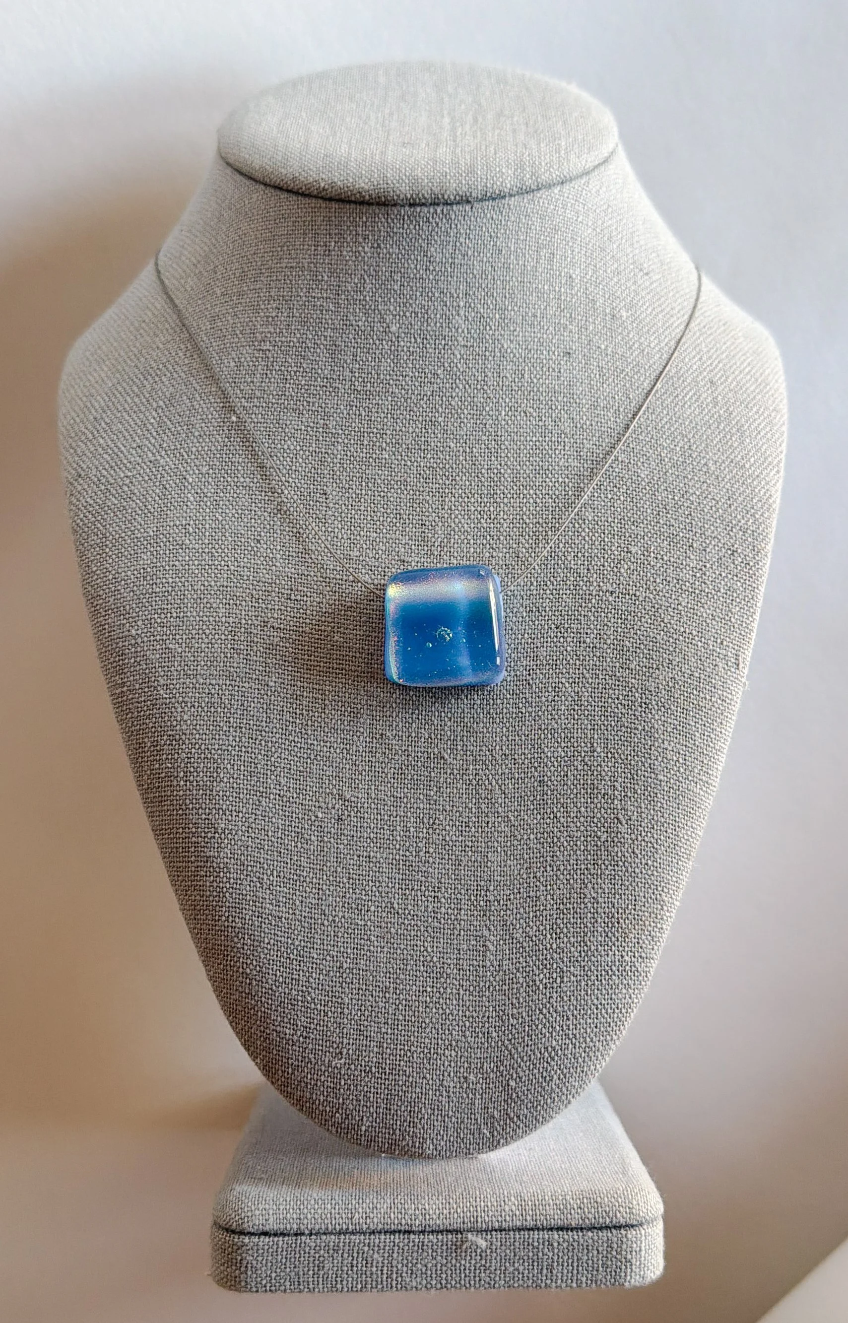holding-summer-necklace-square-1.jpg