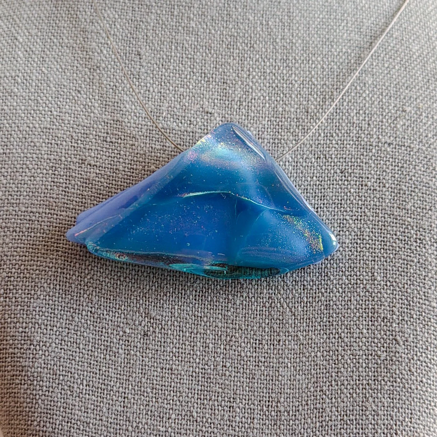 holding-summer-necklace-triangle-150.jpg