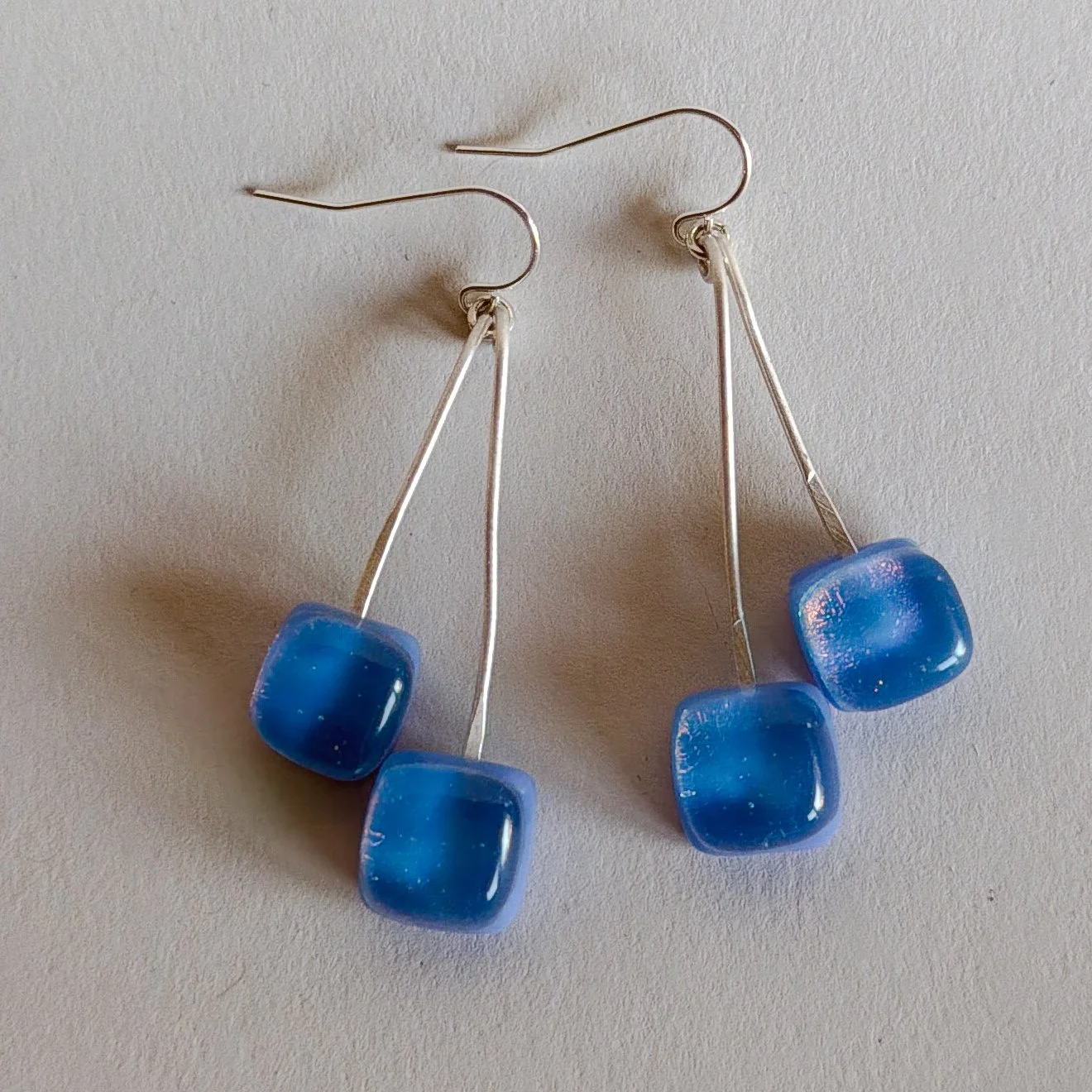 holding-summer-earrings-swing.jpg