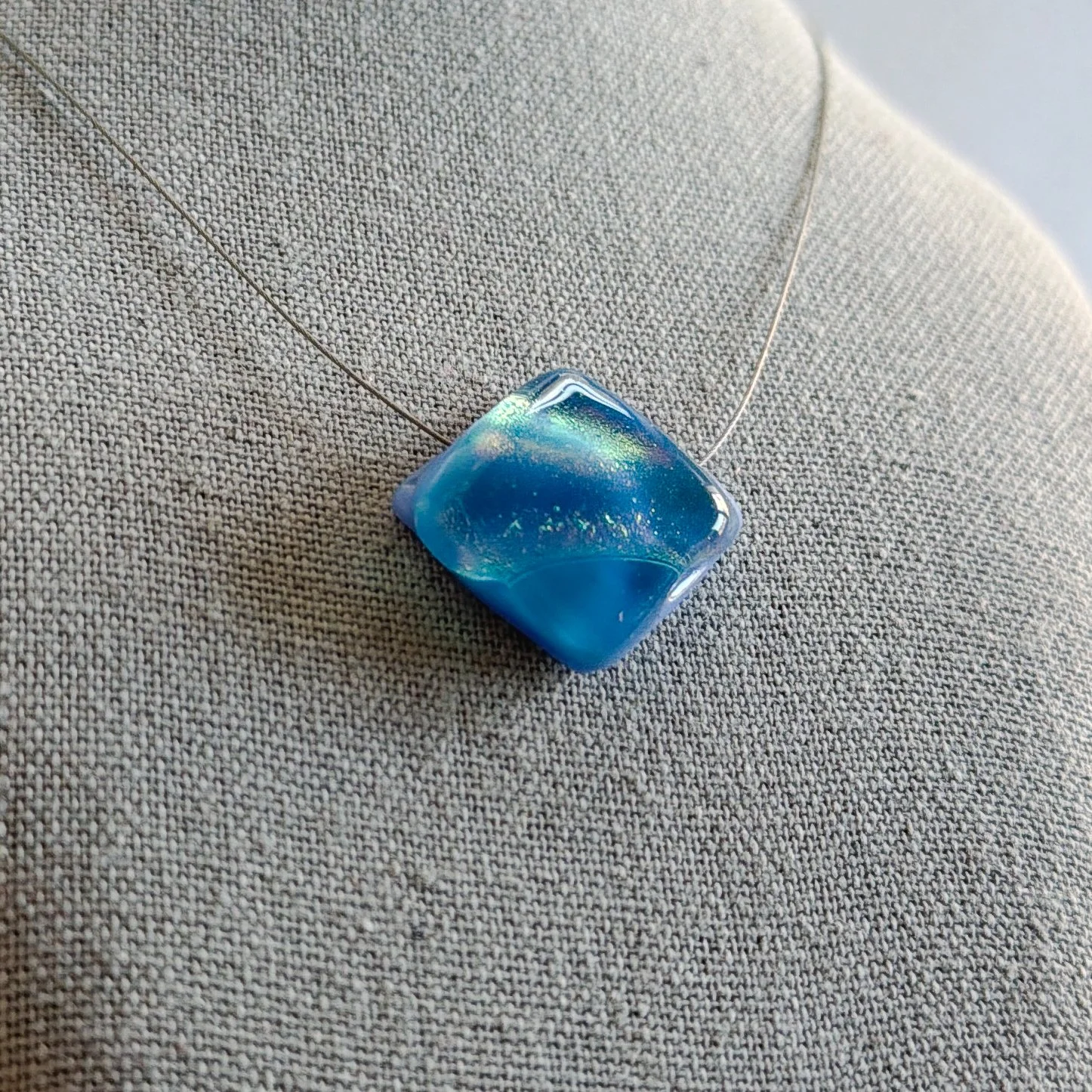 holding-summer-necklace-diamond-1.jpg