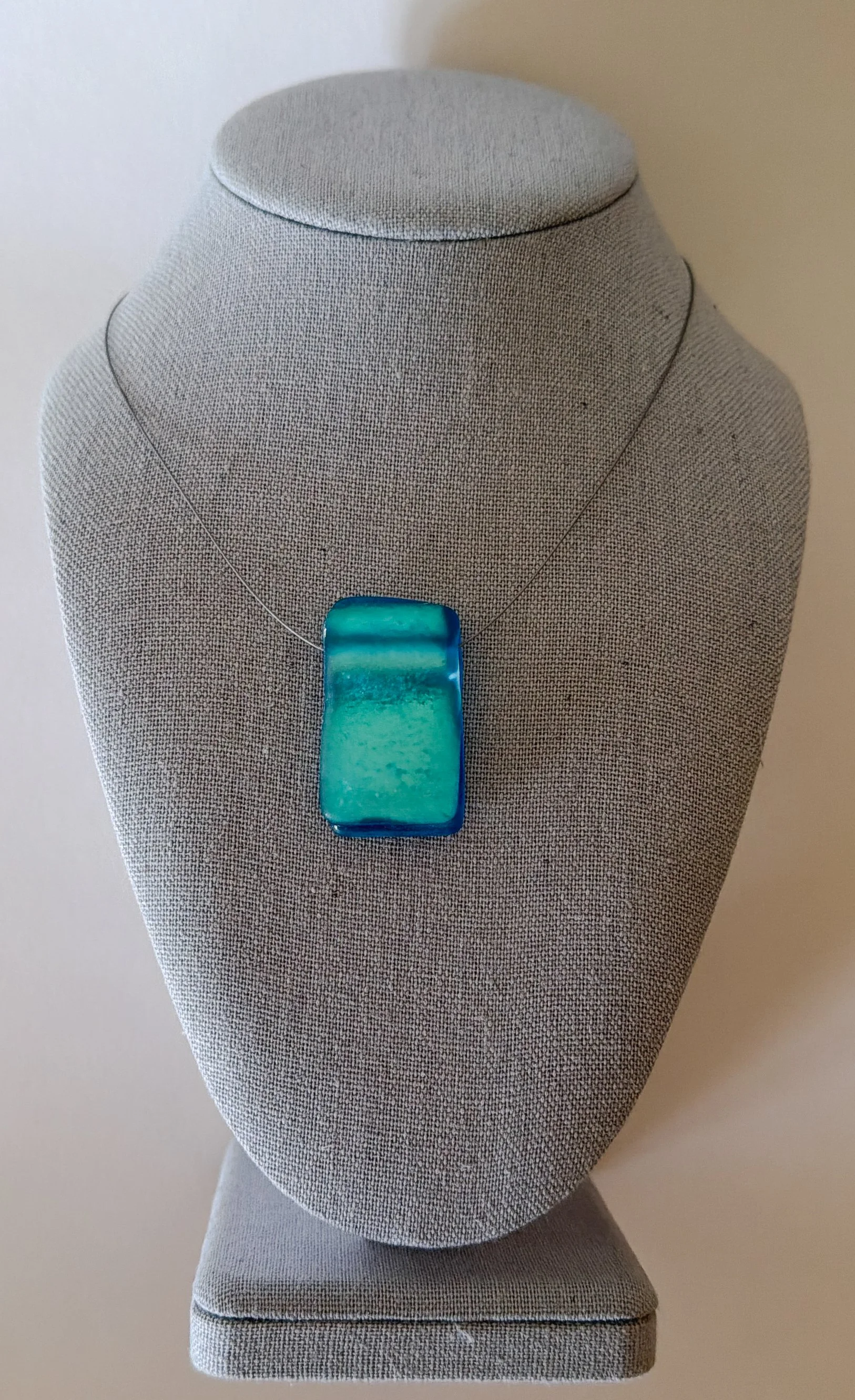 barefoot-in-blue-necklace-rectangle-150s.jpg