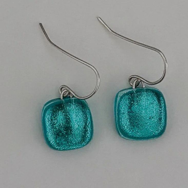 silver-tide-earrings-square-1.jpg