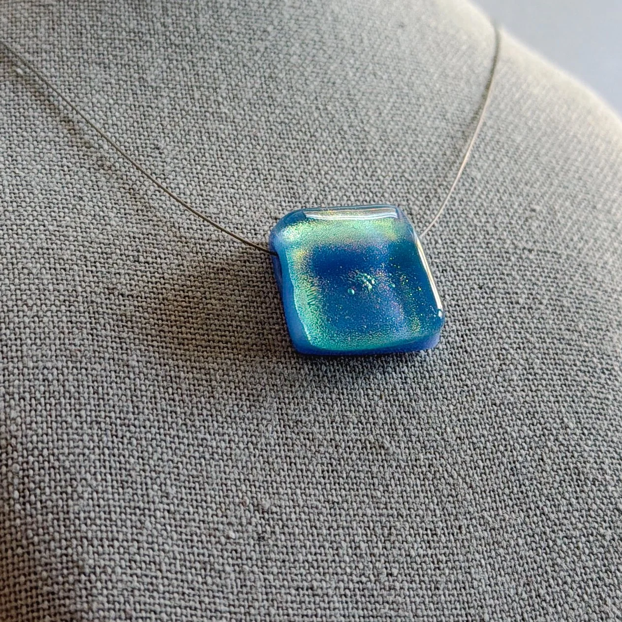 holding-summer-necklace-square-2.jpg