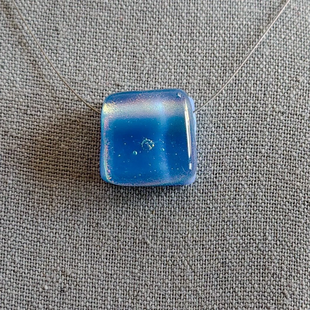 holding-summer-necklace-square.jpg