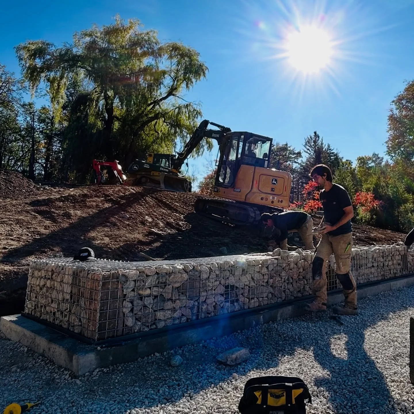 An old stone gate pillar that had collapsed years ago on this property yielded a great source for feature stones to build into our wall.  A little character and site history forever locked into in these gabion cages. 
.
#gabionwall #stonework #landsc