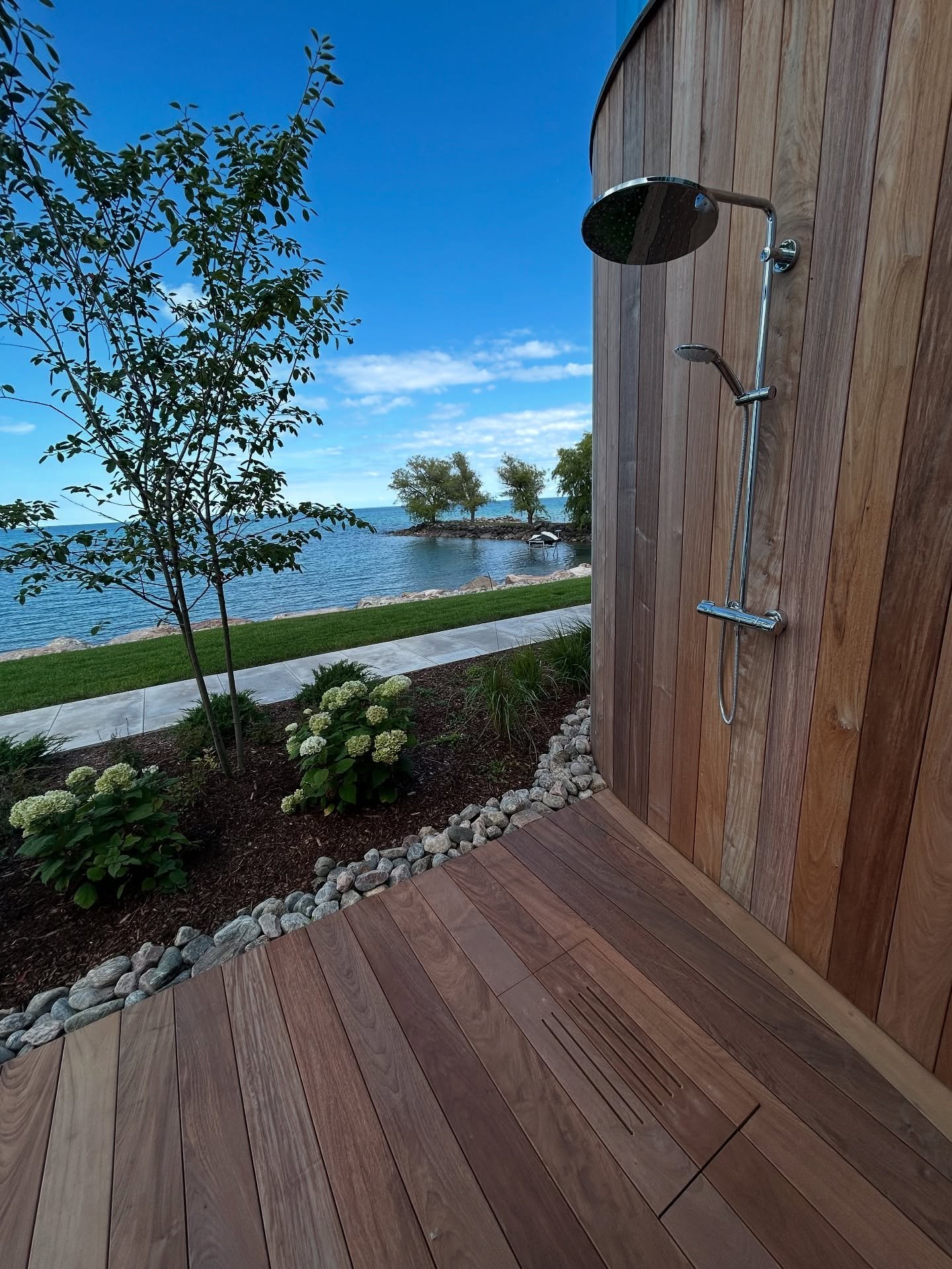 Nice spot to rinse off and warm up after a swim in Georgian Bay. #outdoorshower #livefortheoutdoors #outdoorliving #getoutside #builtforlifeoutdoors #landscapeideas #backyardliving #outdoorshowerideas #luxurylandscapes #backyardresort #georgianbay