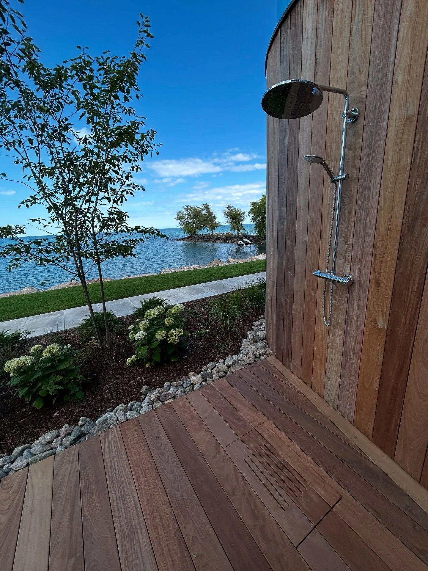 Nice spot to rinse off and warm up after a swim in Georgian Bay. #outdoorshower #livefortheoutdoors #outdoorliving #getoutside #builtforlifeoutdoors #landscapeideas #backyardliving #outdoorshowerideas #luxurylandscapes #backyardresort #georgianbay
