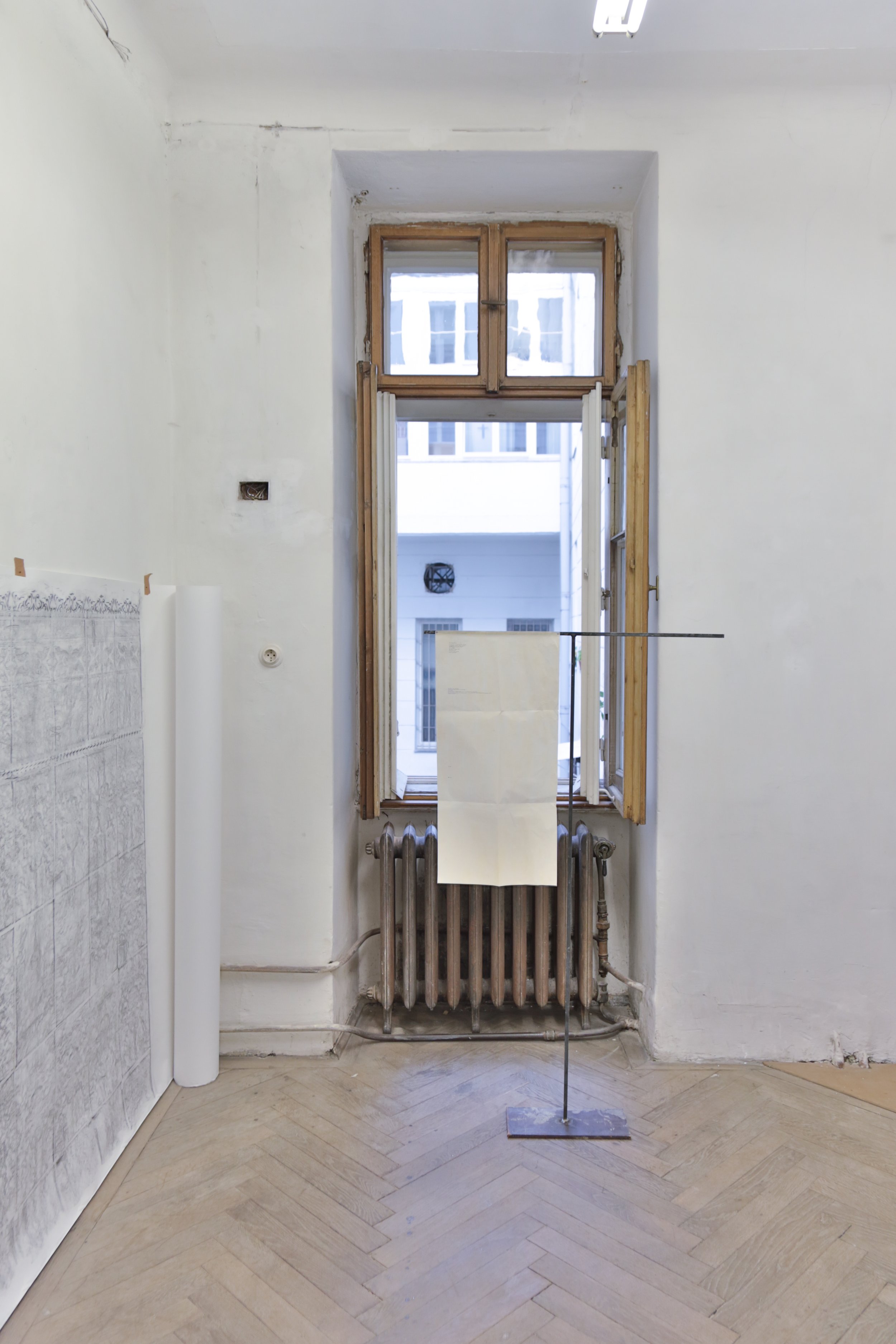   fig15 installation view (left to right)   Winona  (Brussels),    Graphite rubbing of Winona, Rue Van Meyel 49, 1080 Brussels    Switch-Hook  (Chicago),    S-H, Could Vienna hear a whisper in Chicago, witness a light flicker?  
