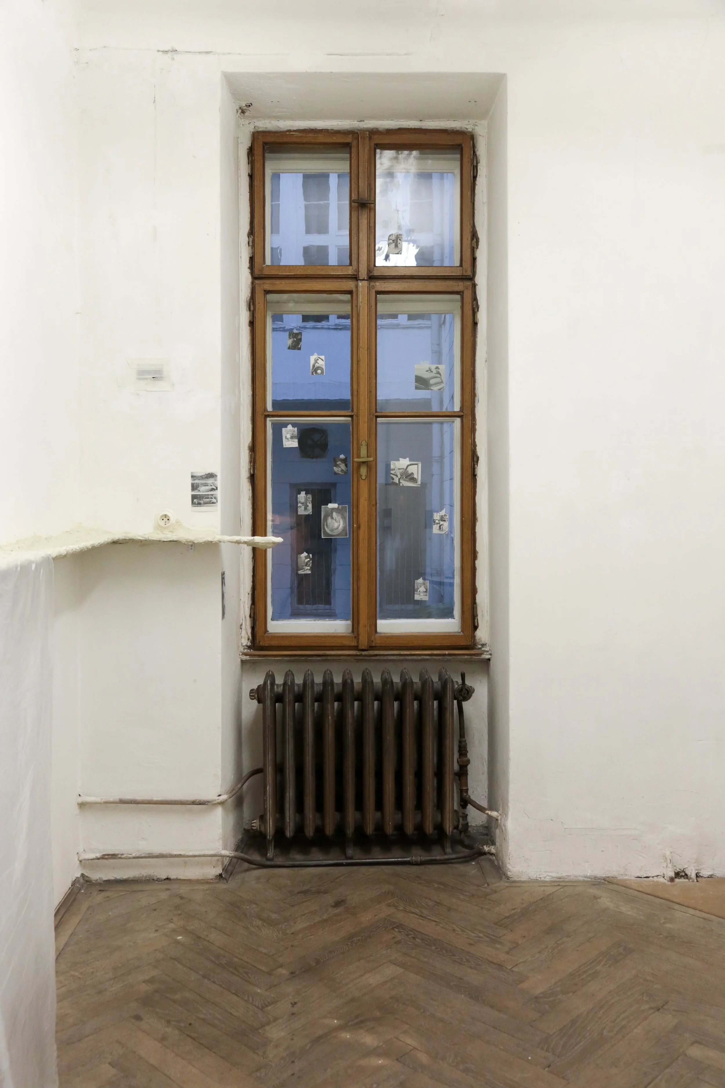   fig32  installation view, Ian Waelder,  accompaniment , 2025, paper mache, new and used piano keys, plastic film, air-dry porcelain, prints on paper, tape, switched-on light bulbs, site specific dimension 