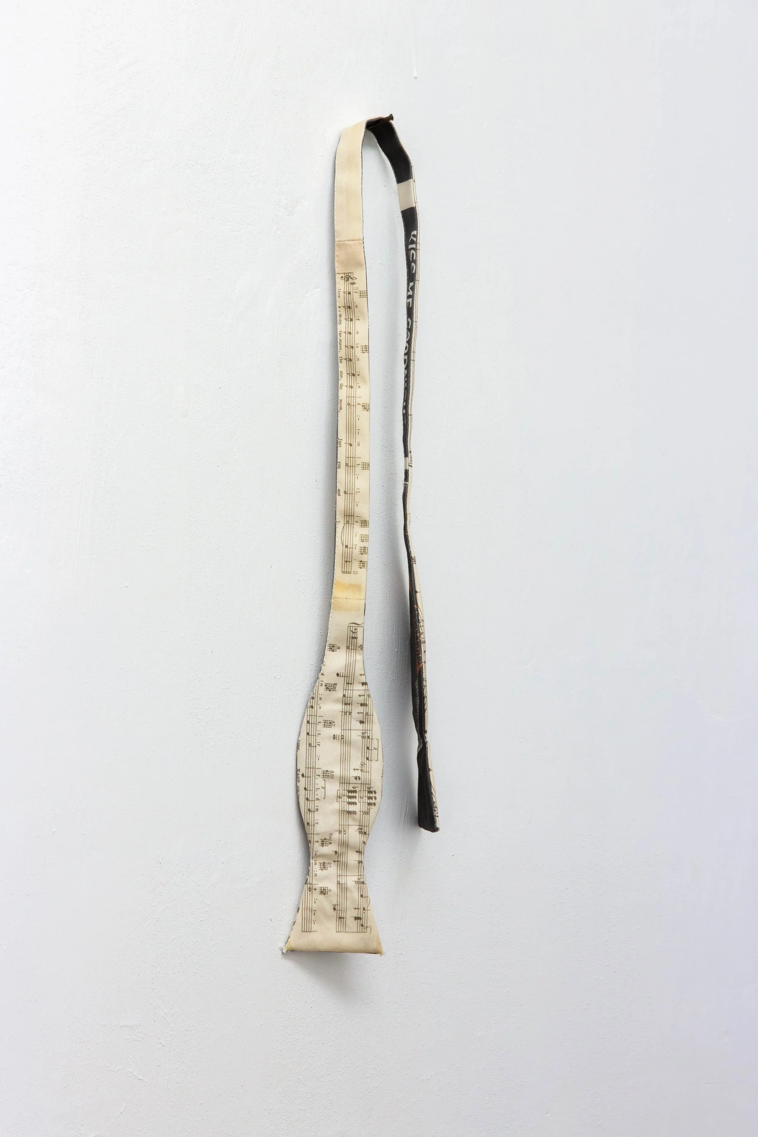   fig17  Persijn Broersen &amp; Margit Lukács, Smári Róbertson,  Bridle (overture, interlude, coda) , 2026. printed canvas bow ties/ printed satin bowties (worn), various dimensions 