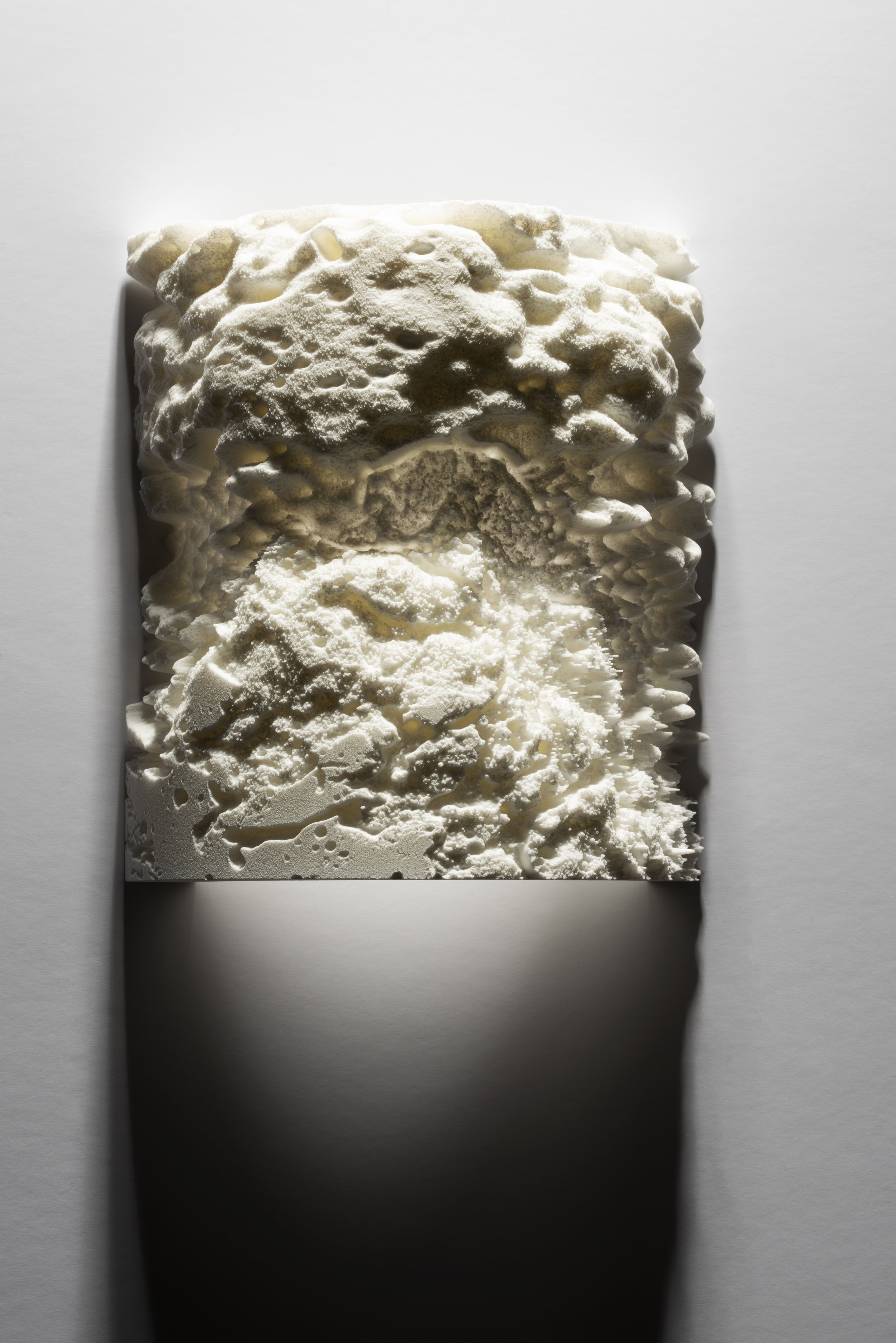  Lithophane model with a spotlight for the viewer to study and touch tangible sea from an image. 