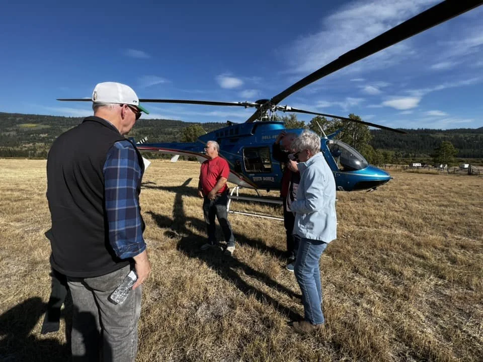 Premier Horgan and Ministers with helicopter in Nemiah Valley