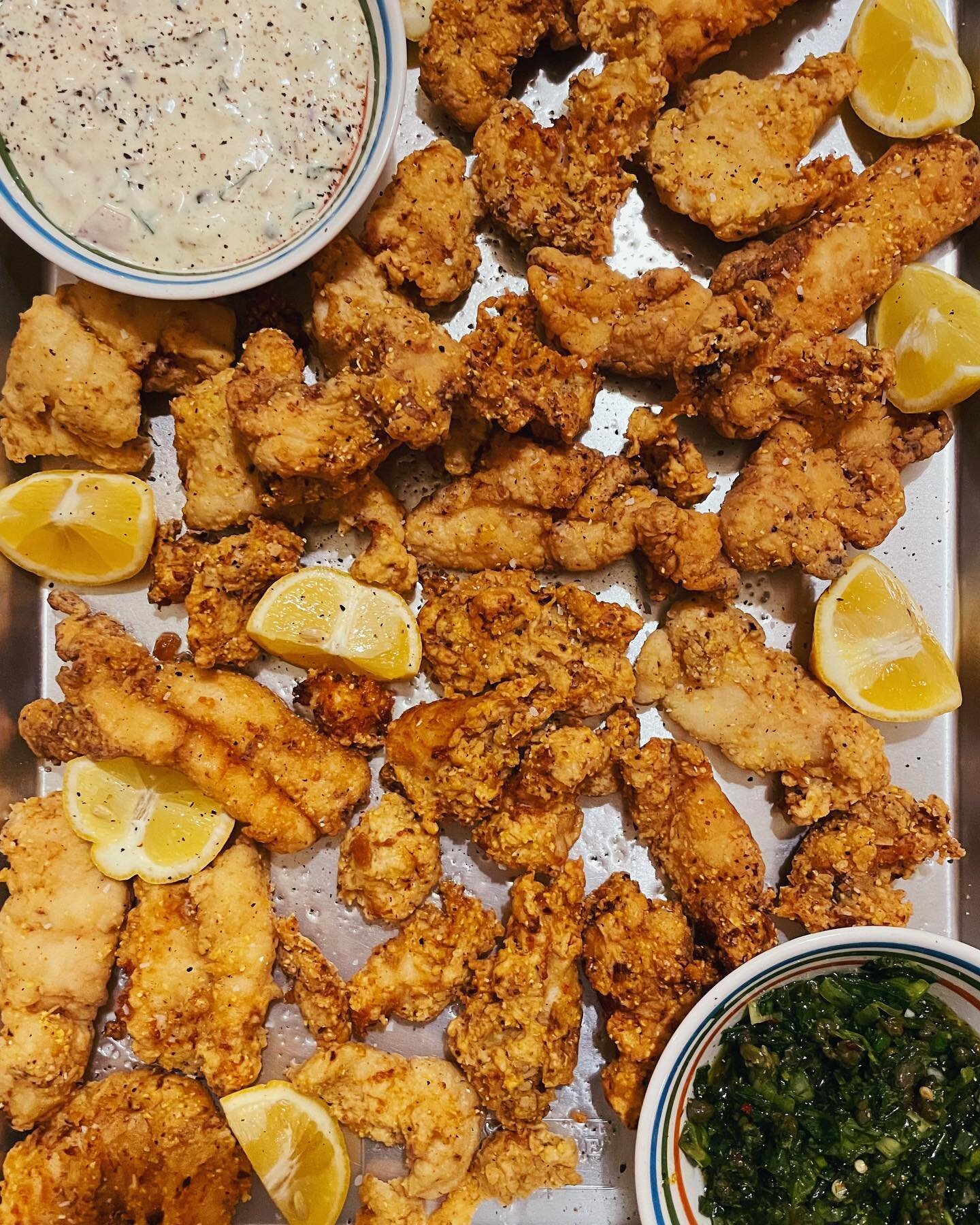 crispy crunchy cornmeal fried snapper fingers with red snapper from @valsoceanpacific! served with lots of lemon, a radicchio slaw, fried caper salsa verde, and some very good herby tartar sauce with shallots, scallions, garlic pickles, and more! 🐟