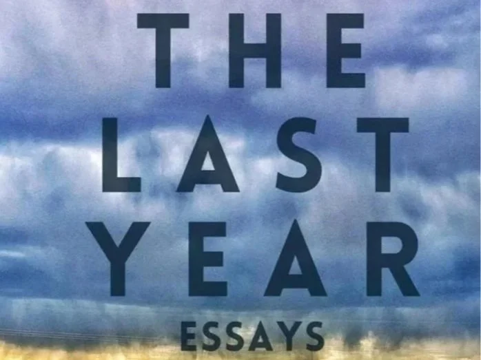 The Last Year: Essays Front Cover with road and storm in distance