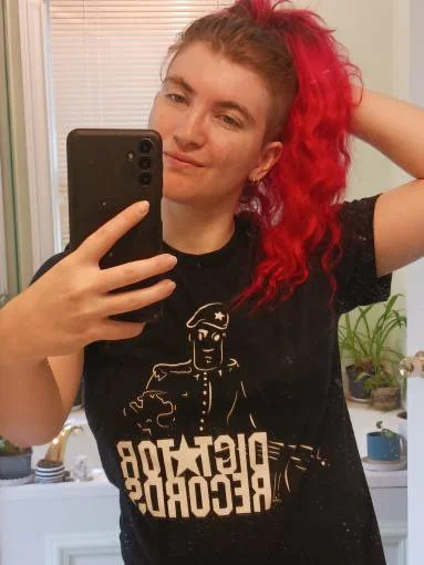 Asa Wearing Dictator Records T-Shirt.JPG