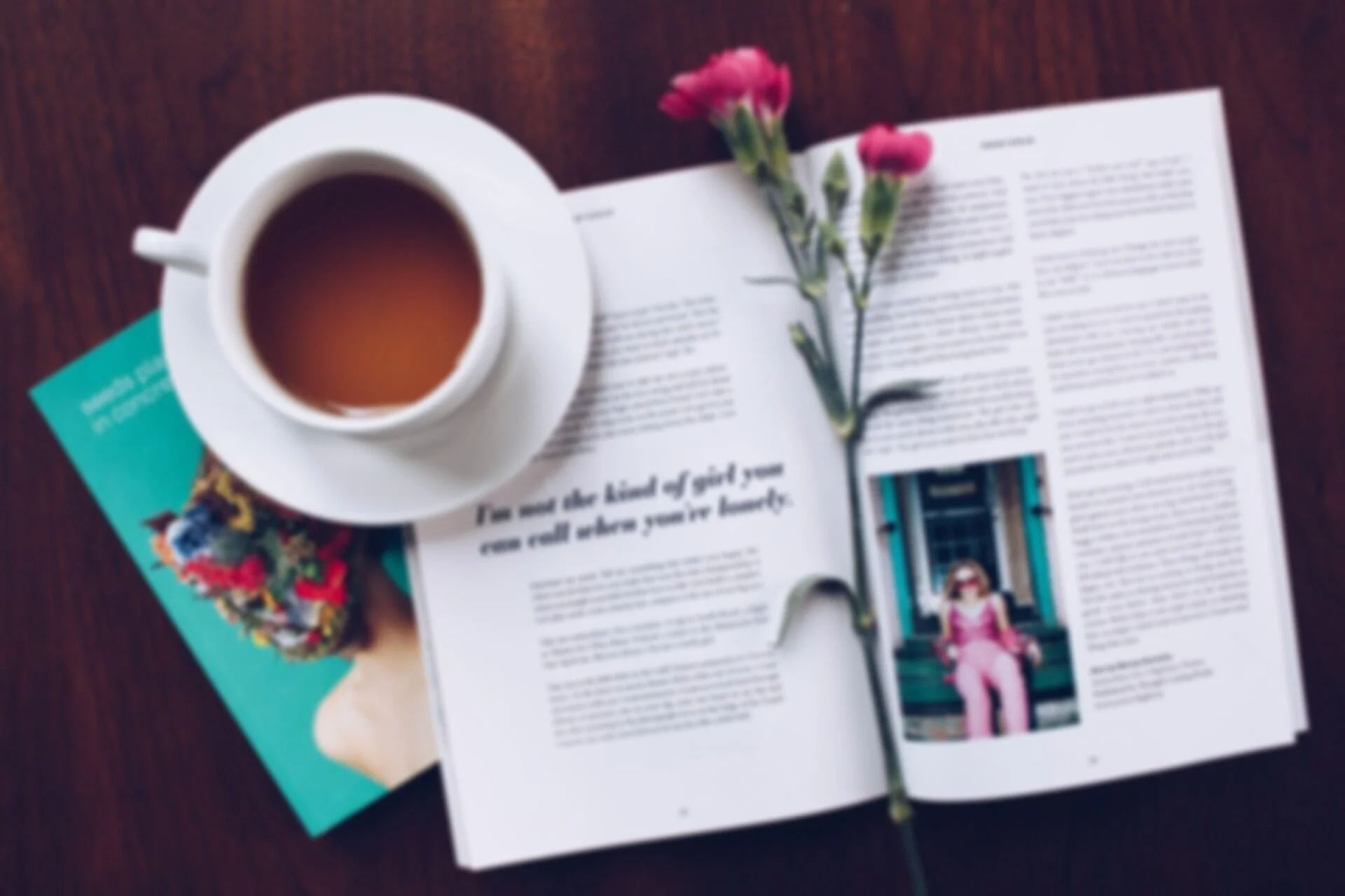 Coffee%2C+magazine+and+red+flow+on+a+desk.+Photo+by+Thought+Catalog+on+Unsplash.jpg
