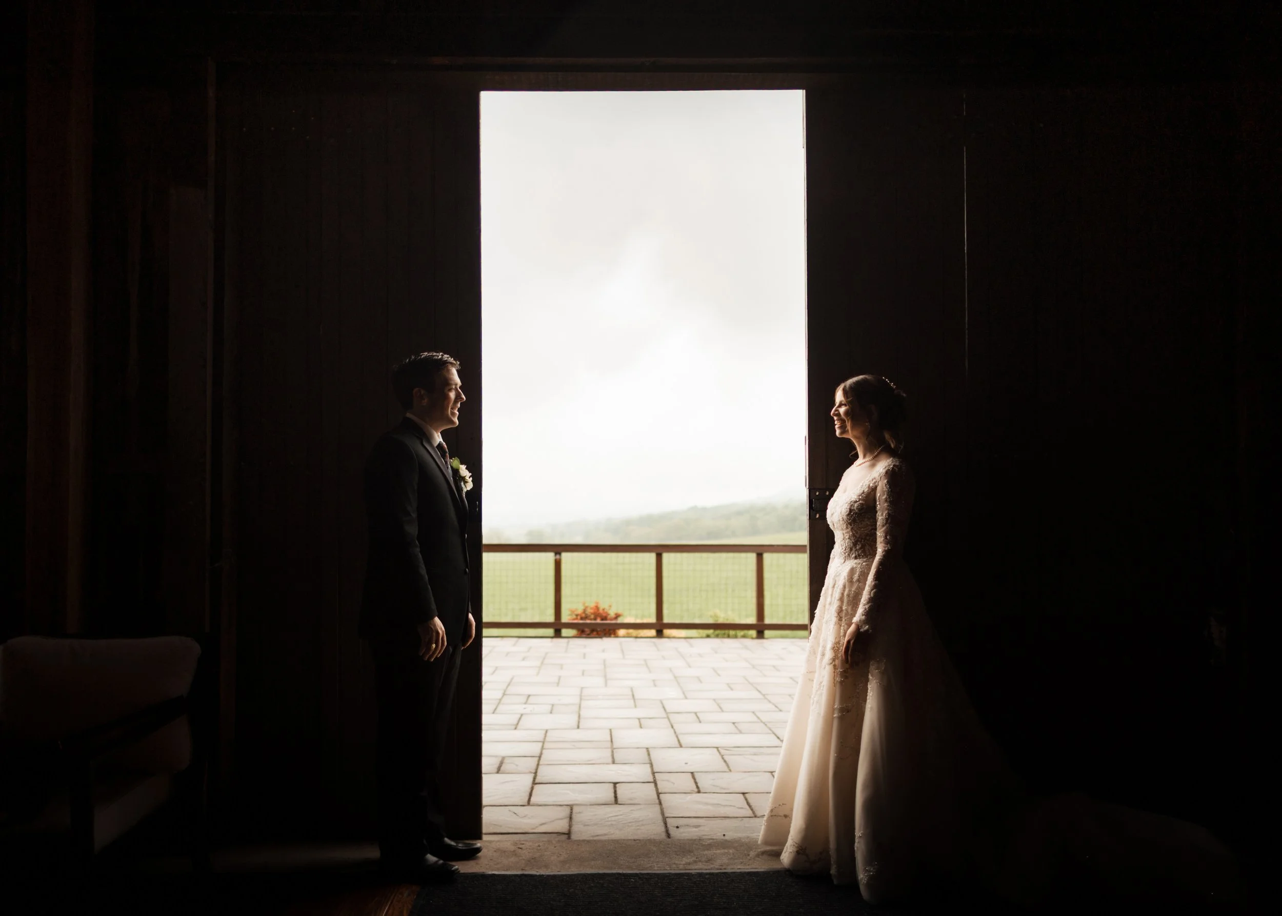 Romantic wedding portrait of a bride and groom at Stone Spring Farms in Hamburg PA, showcasing rustic elegance with historic stone backdrops. Captured by a Berks County wedding photographer specializing in intentional, intimate celebrations.
