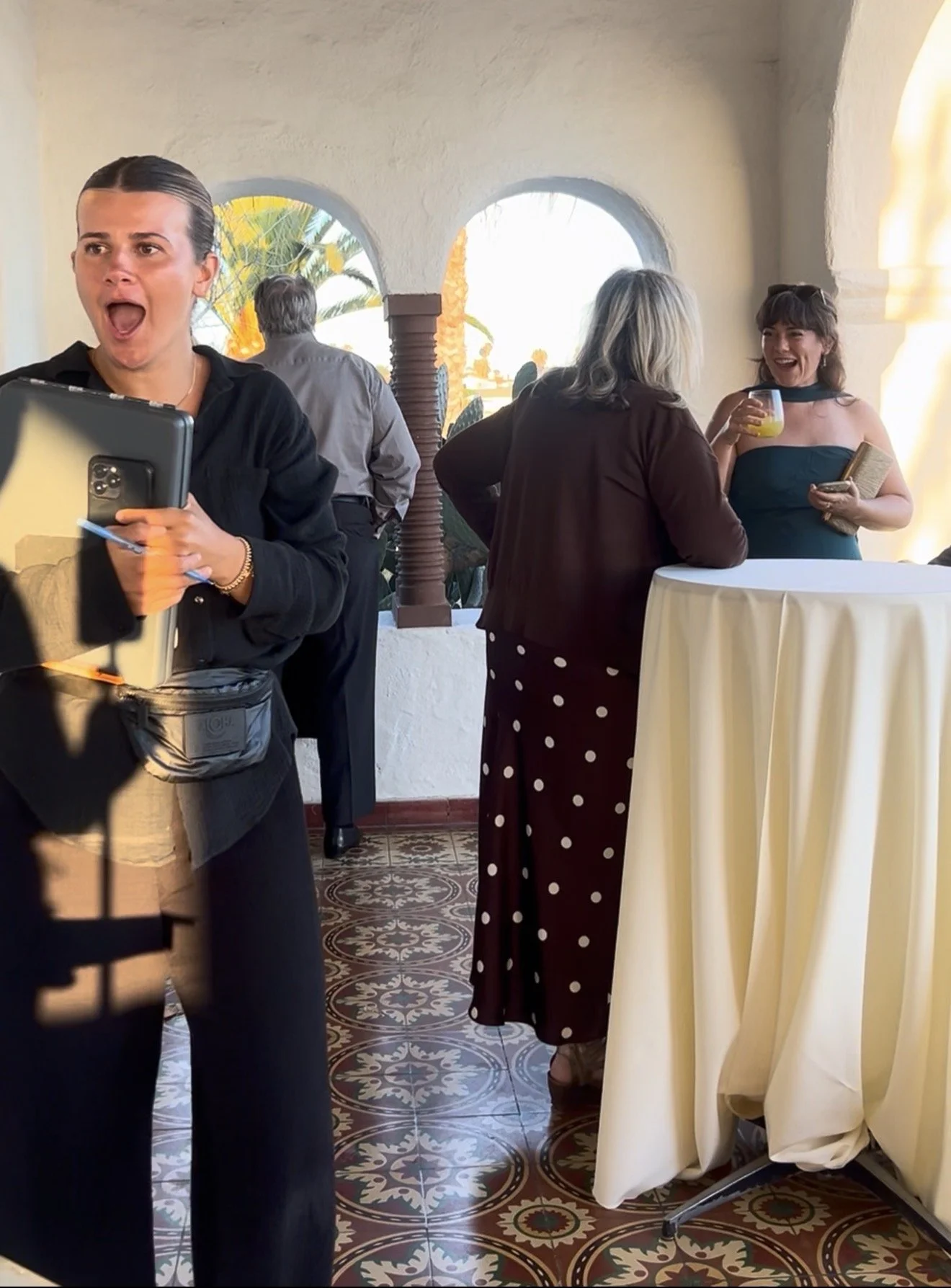 shocked and amazed wedding planner witnessing live wedding painting
