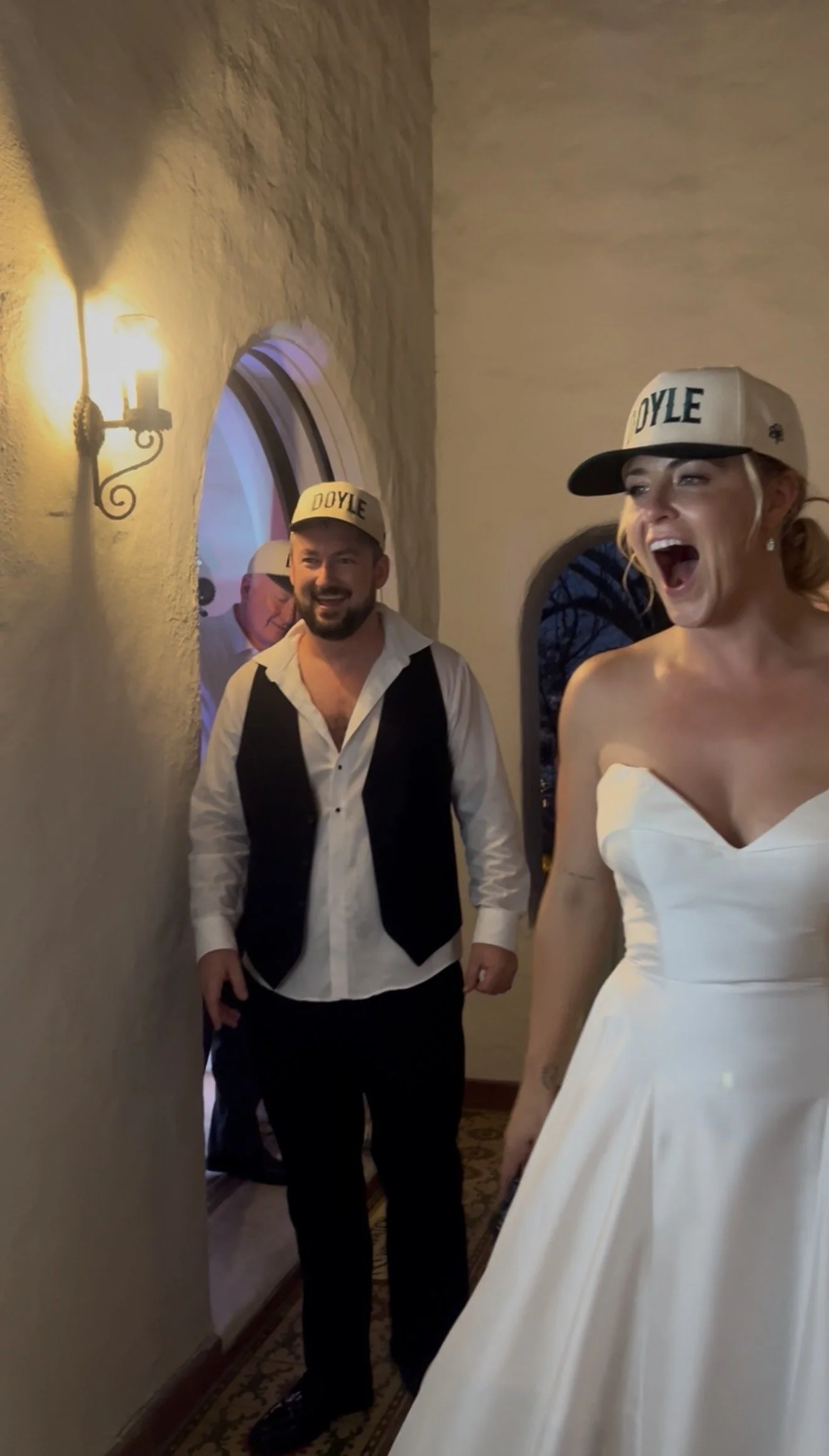 bride's reaction to live wedding painting at wedding reception at casa romantica in san clemente california