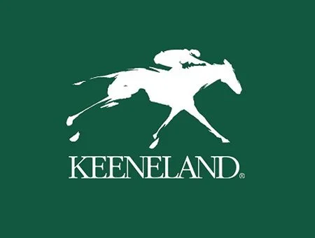 White silhouette of a horse and rider on green background with the text 'KEENELAND' underneath.