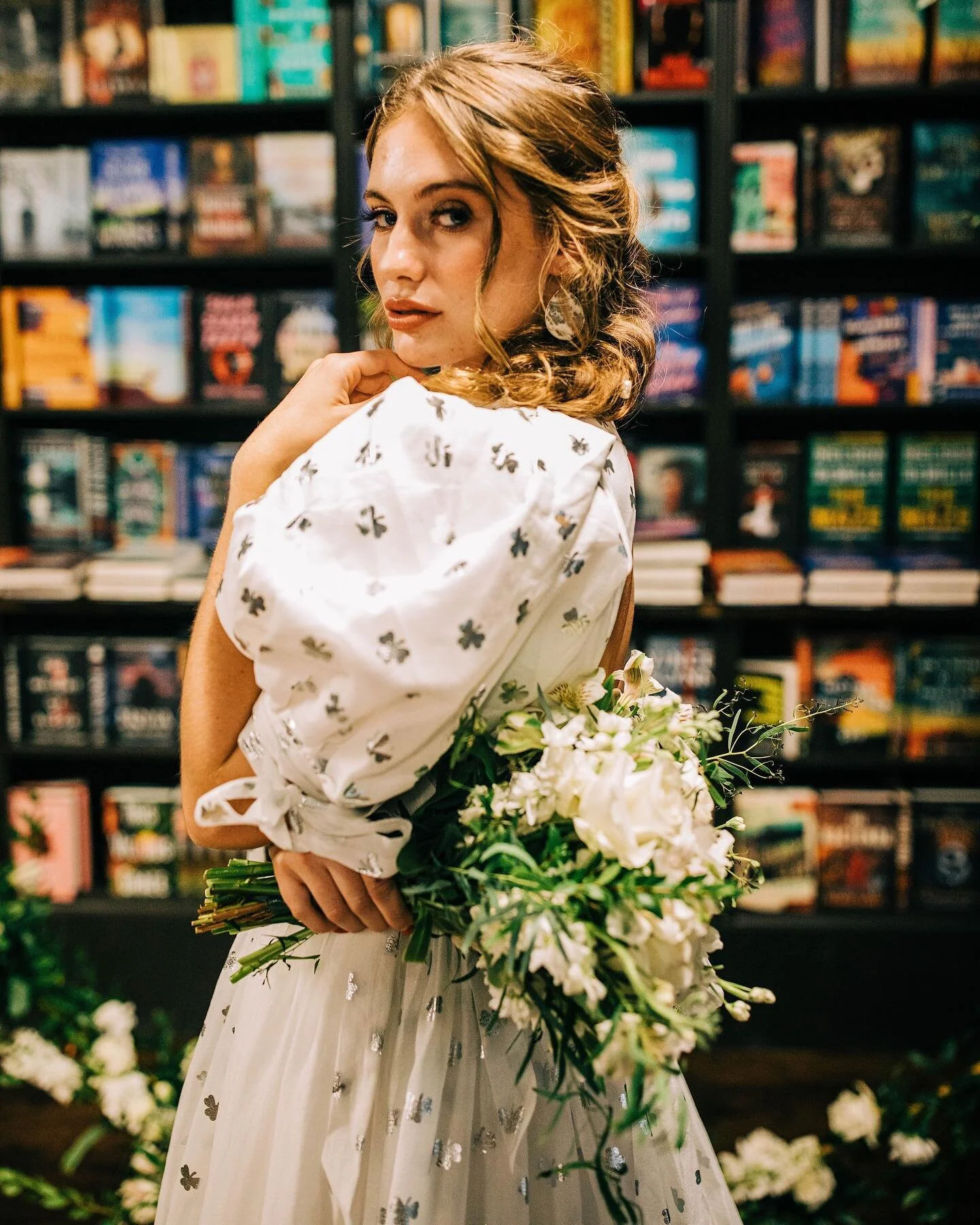 In the end, we&rsquo;ll all become stories. 

.

Host: @lucky15photography
Photographer: @jordandevin_photo 
Hair: @shelby.mcduffie.hmua
Makeup: @skelsingartistry
Dresses: @lucky15photography
Florals: @bloomandivyweddings
Venue: @insidestorybookstore