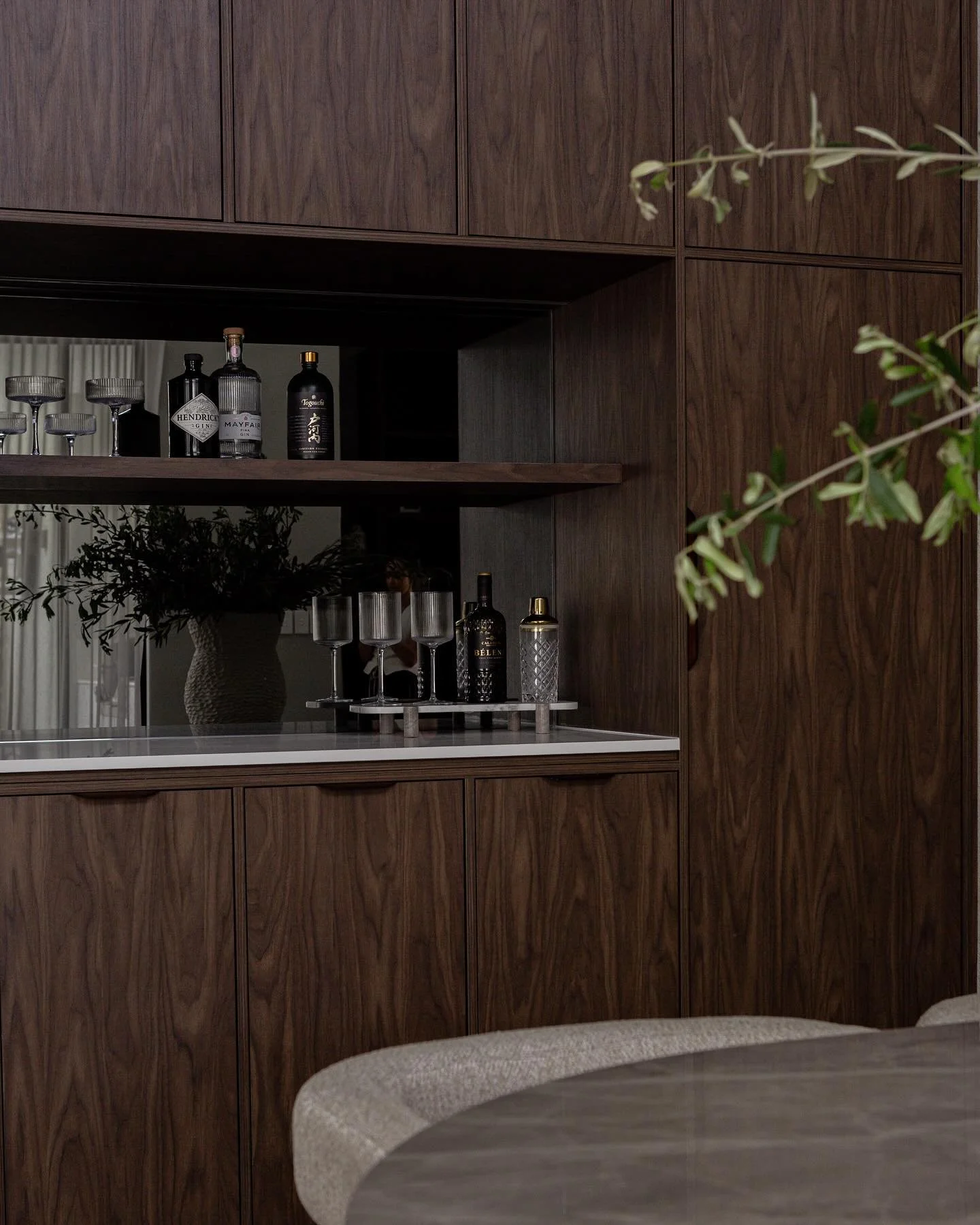 Different views of this gorgeous dining space in Floreat.
So many details to love in this home, one of our favourites being the stunning walnut cabinetry 🤎

#curatedliving #elevatewithPSCO #designthatsells